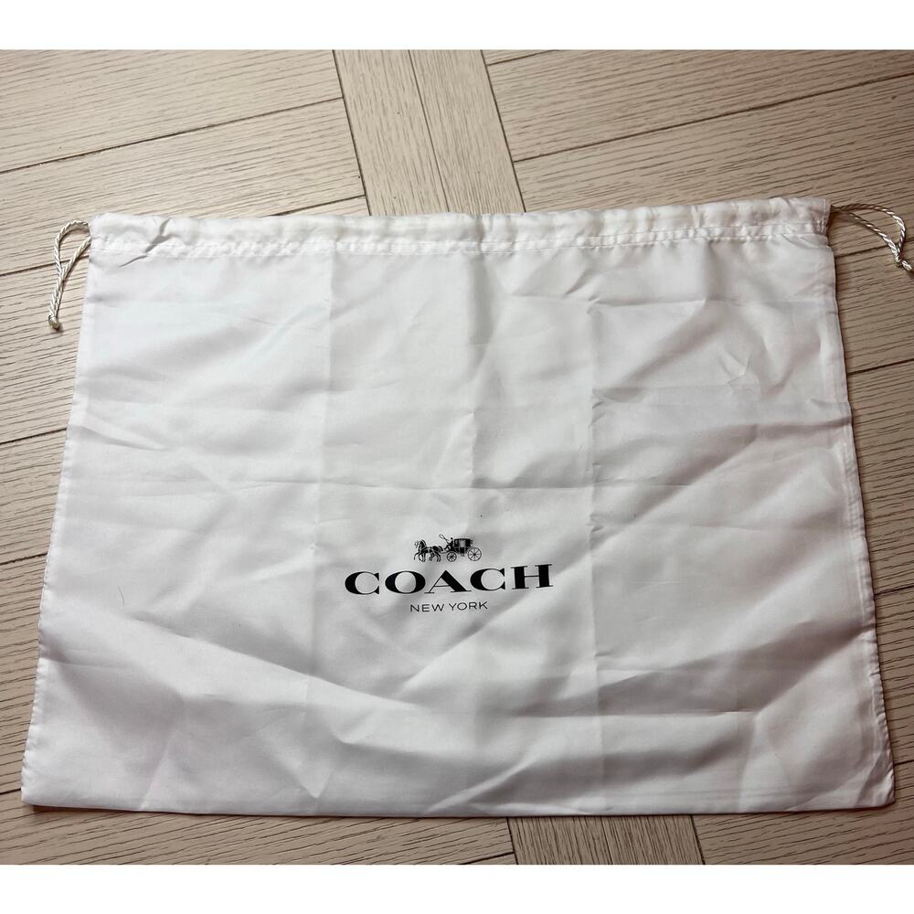 Coach drawstring dust bag, travel bag.‎ Measures 19”x14”. Handbag storage.